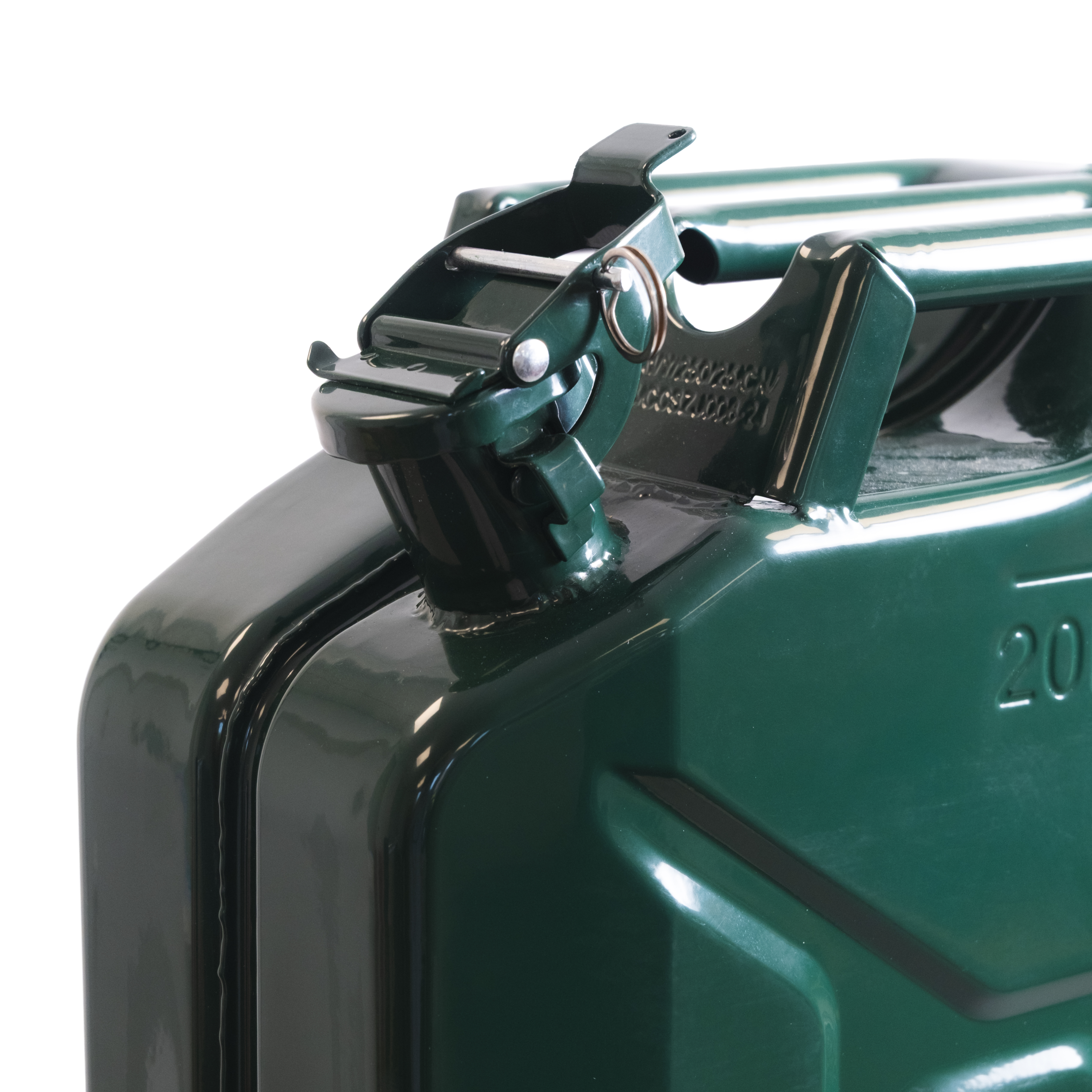 Close-up of a green metal stapler mechanism with a curved lever and metal pin.